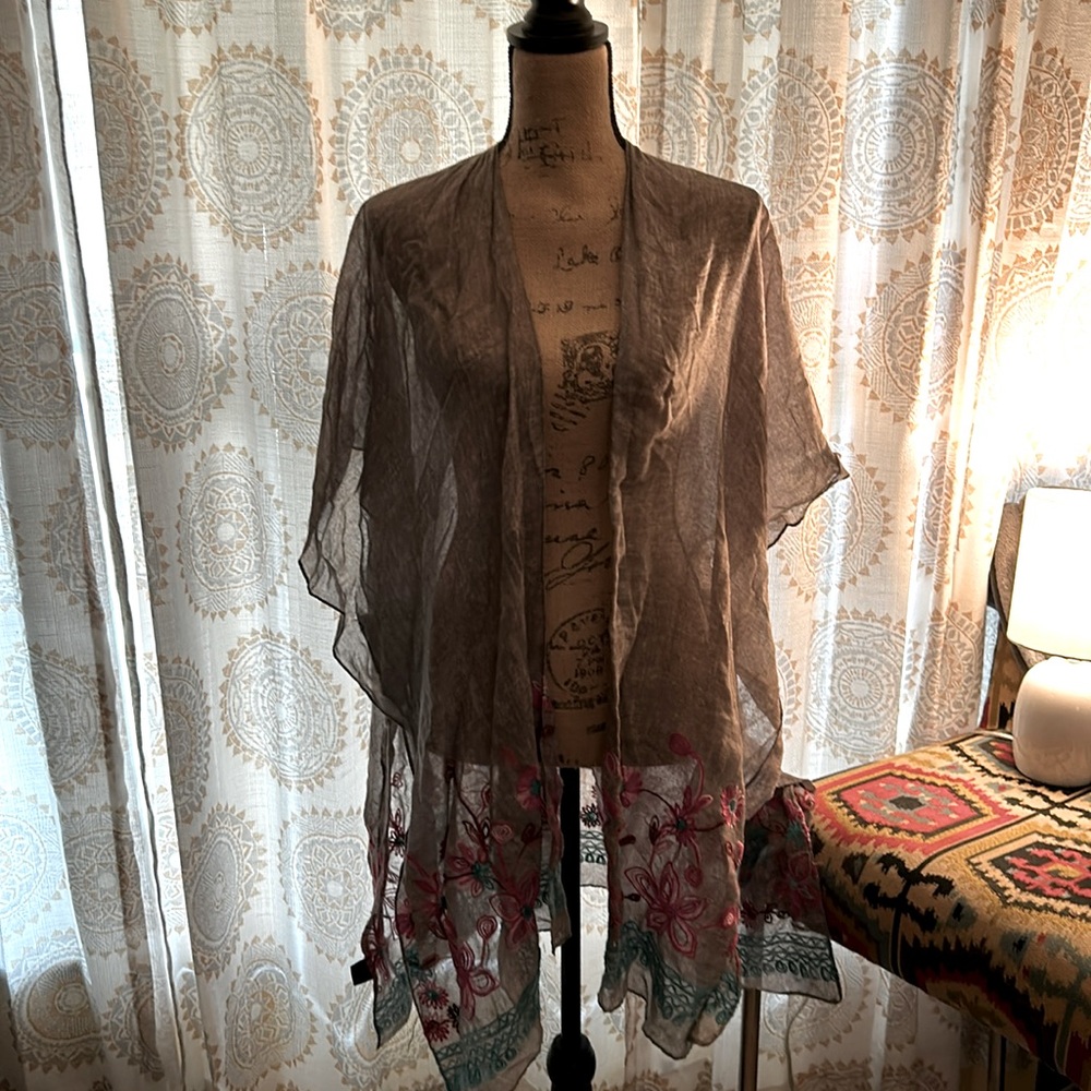 Gently used cute gray embroidered shawl.